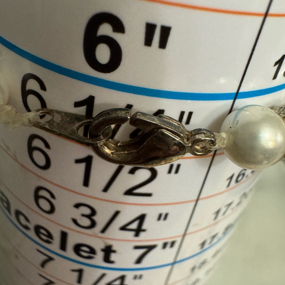 Elegant Dainty Pearl Bracelet Set- White Simulated
Pearls with Silver Accents - Picture 7 of 8